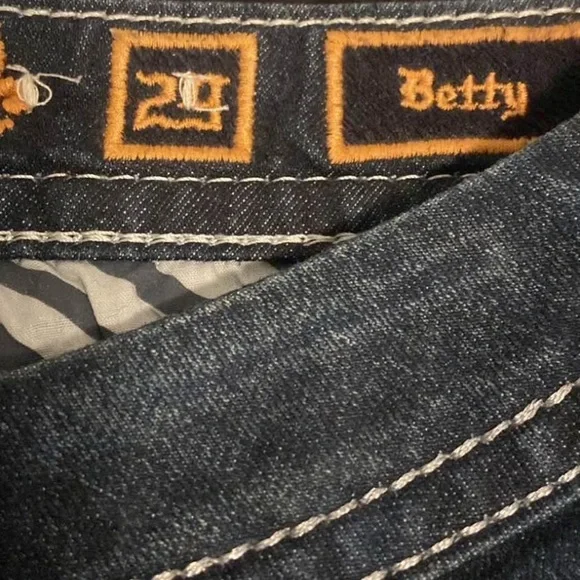 Rock Revival Dark Blue Boot Cut Jeans with Silver Accents - Picture 3 of 5